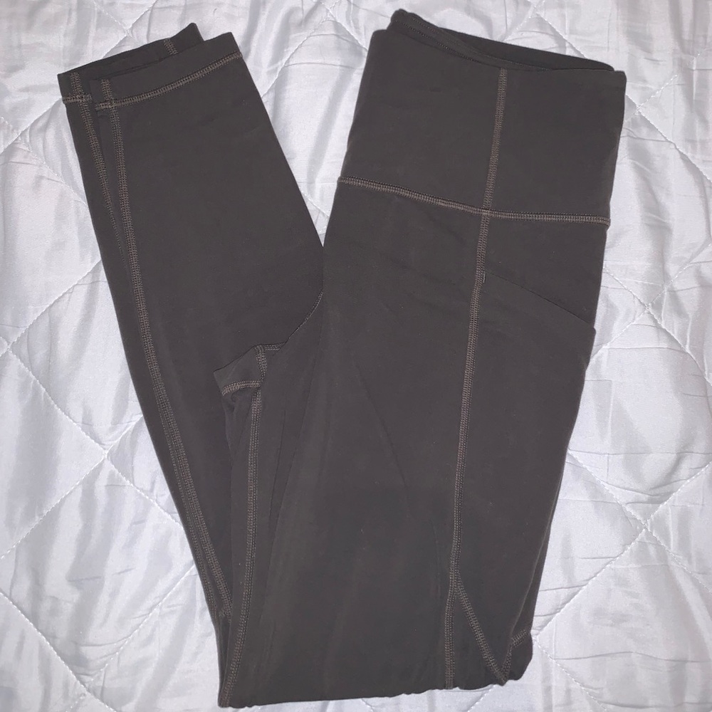 Athleta Stash Pocket Salutation Tight